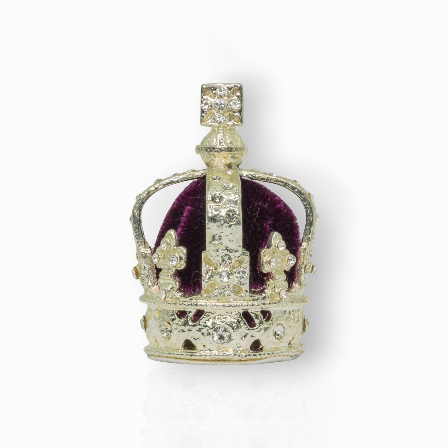 Decorative crown with purple velvet center on a white background.