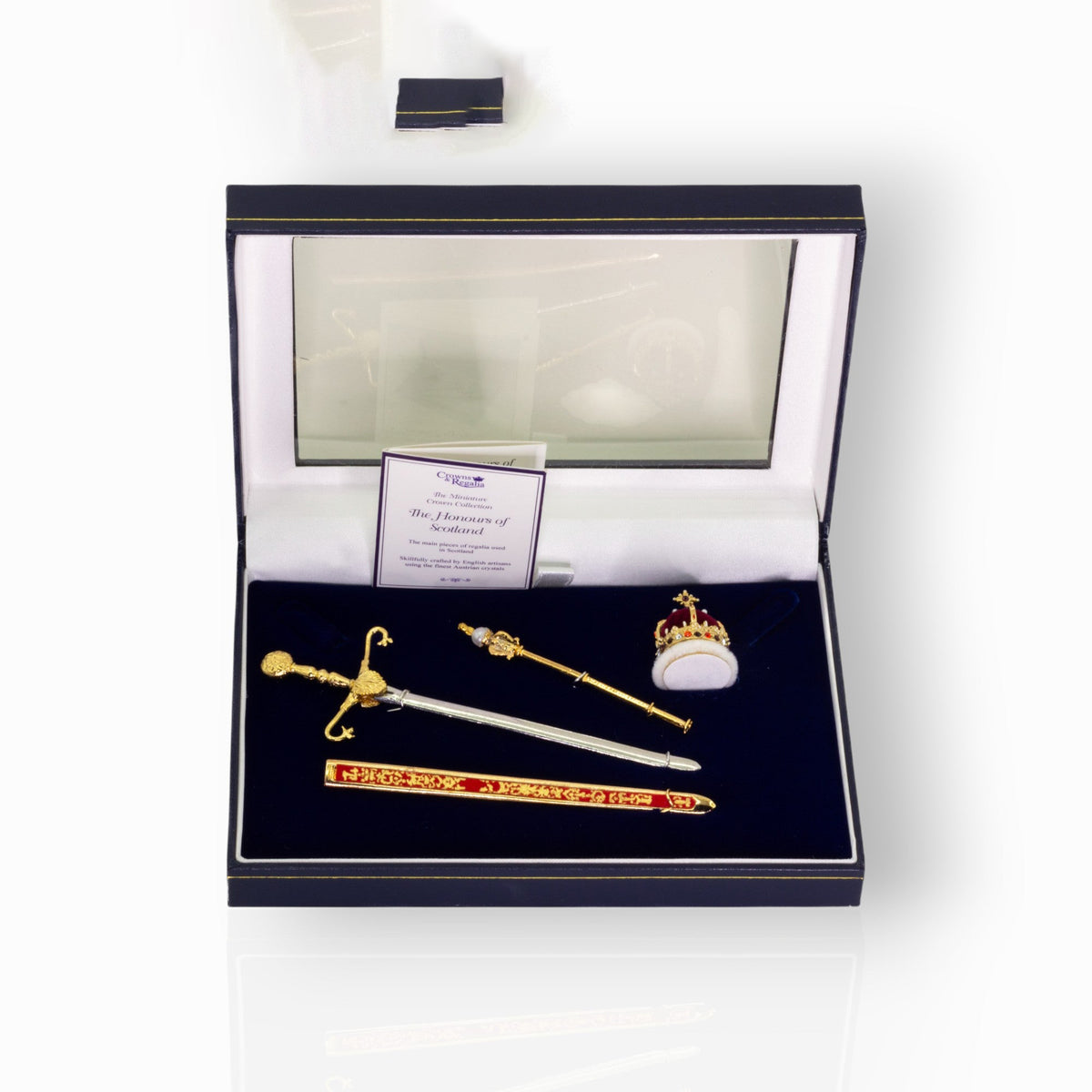 Crown miniatures on a black display box.