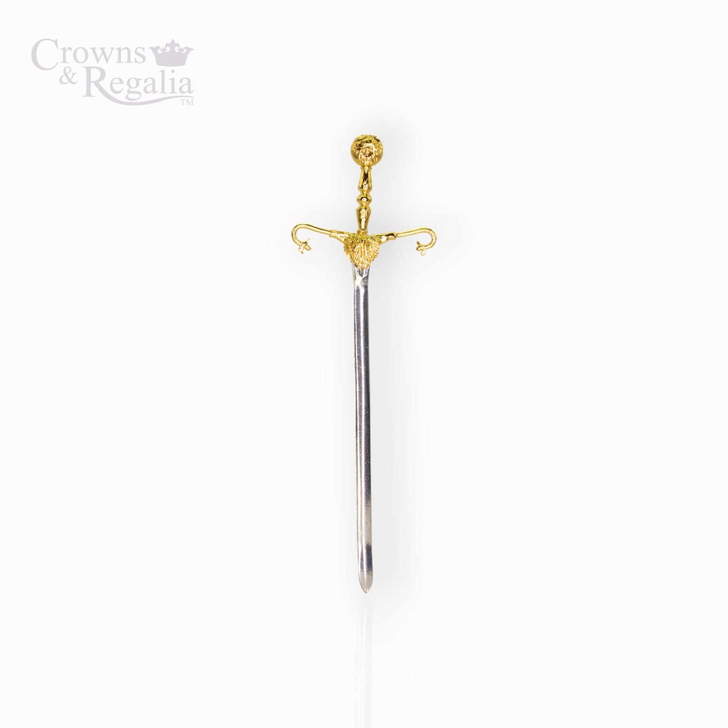 Decorative sword with gold hilt on a white background.