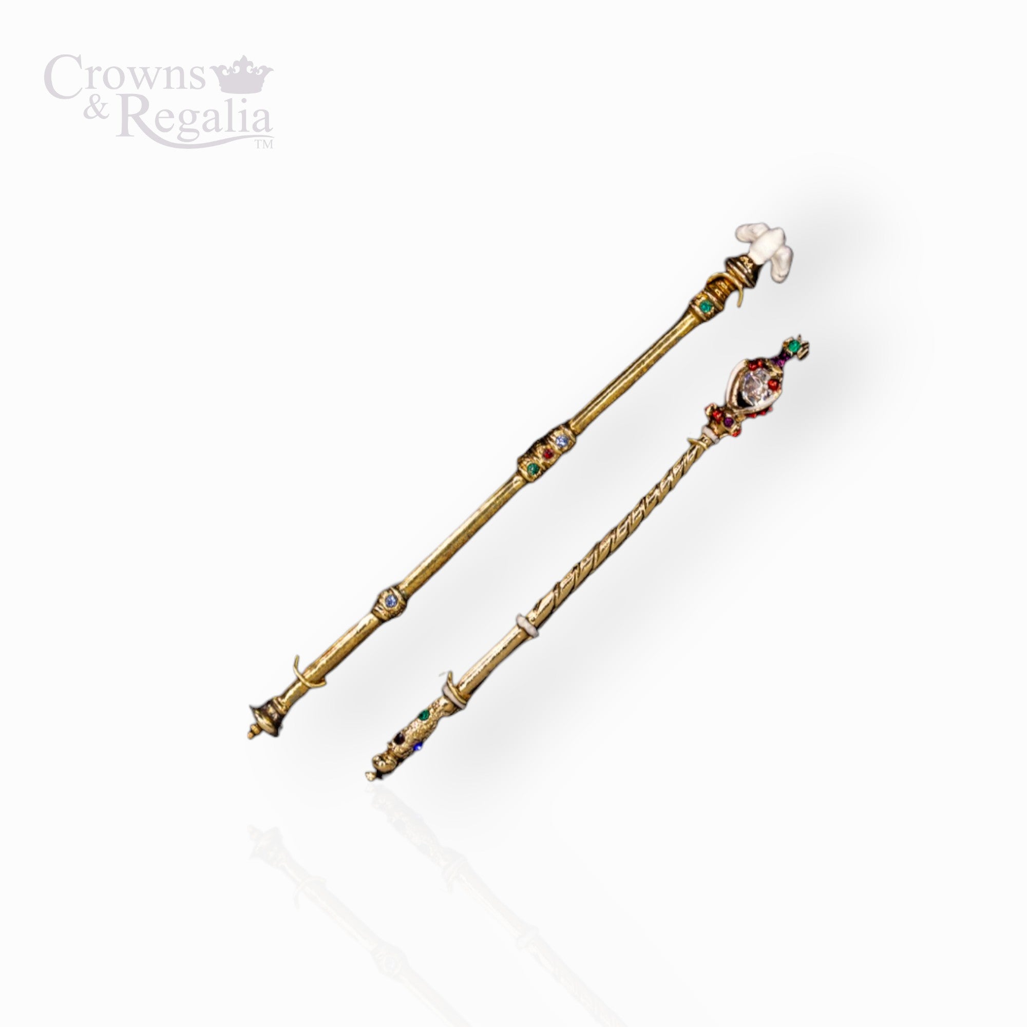 Decorative staff with gemstones on a white background, branded 'Crowns & Regalia'.