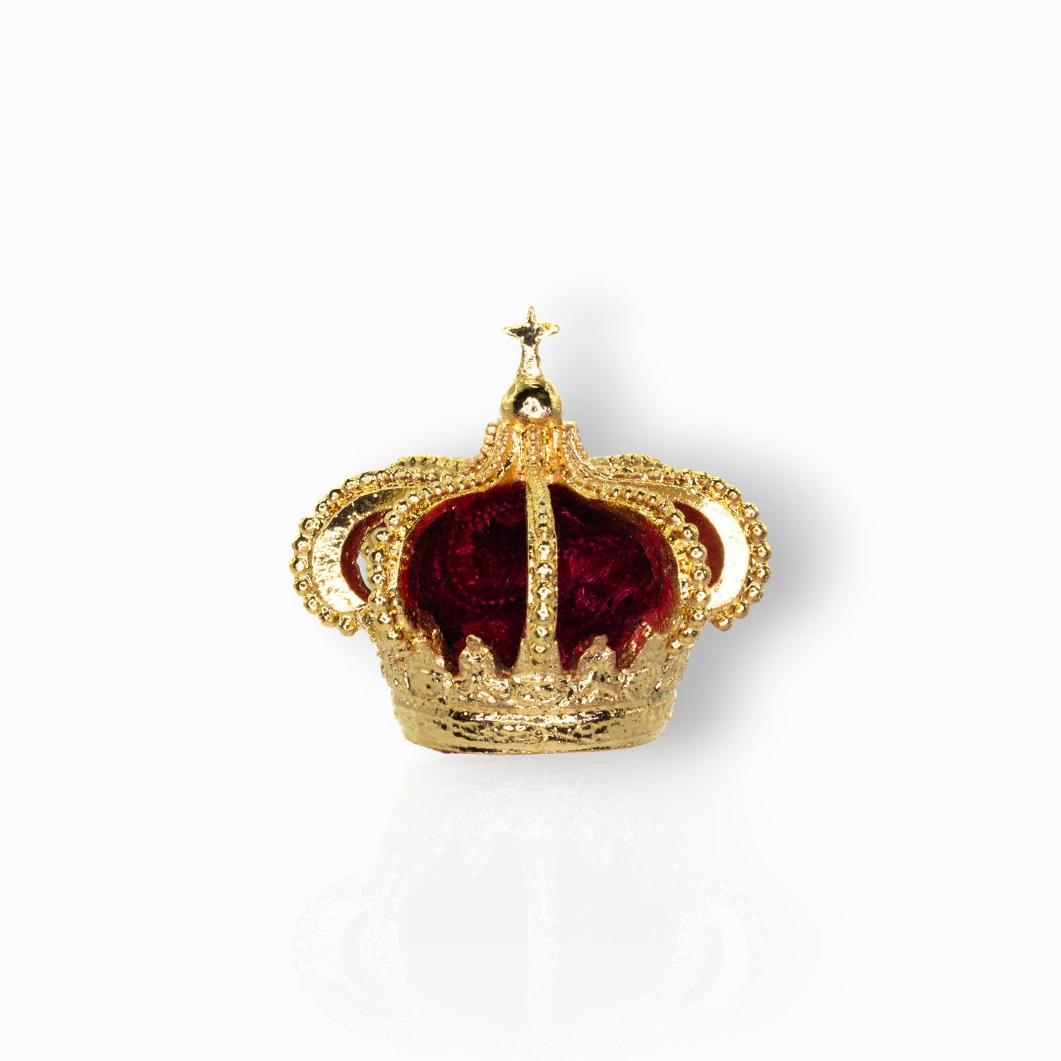 Gold crown with red interior on a white background.