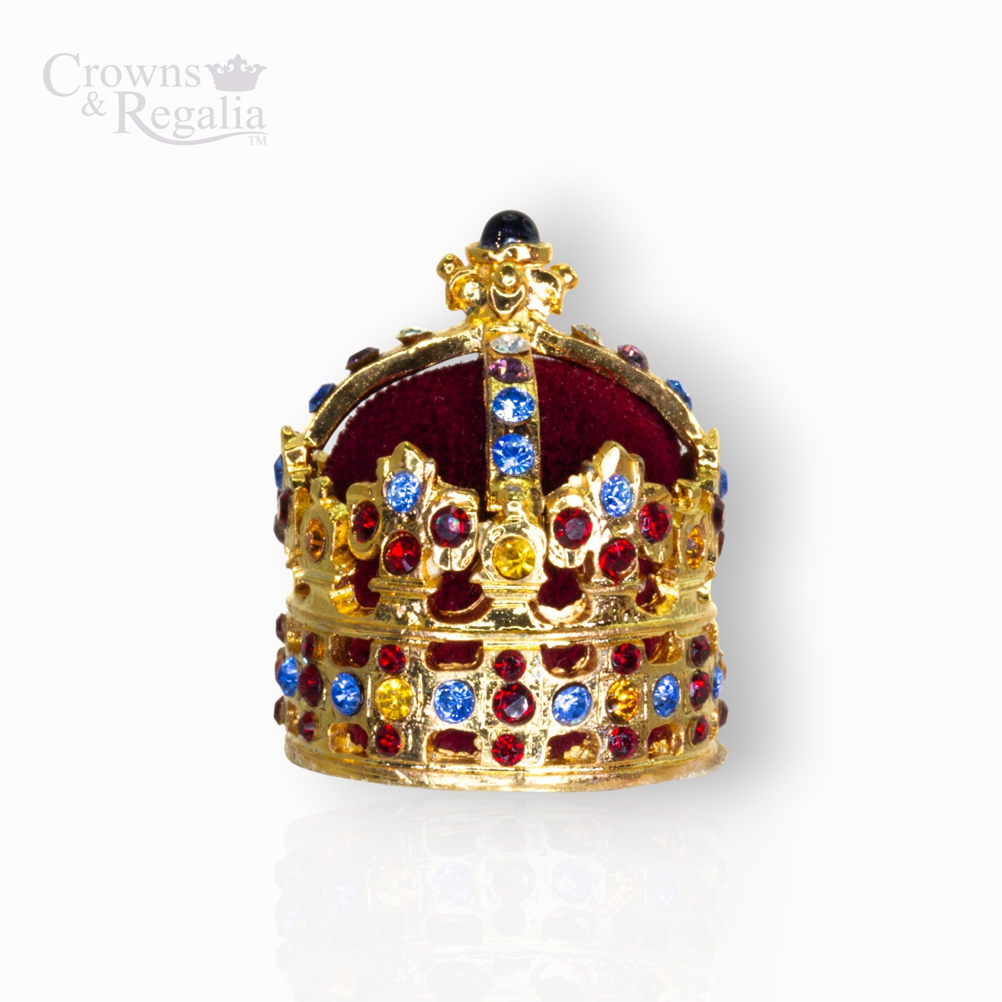 Decorative crown with colorful gemstones on a white background, branded 'Crowns & Regalia'.