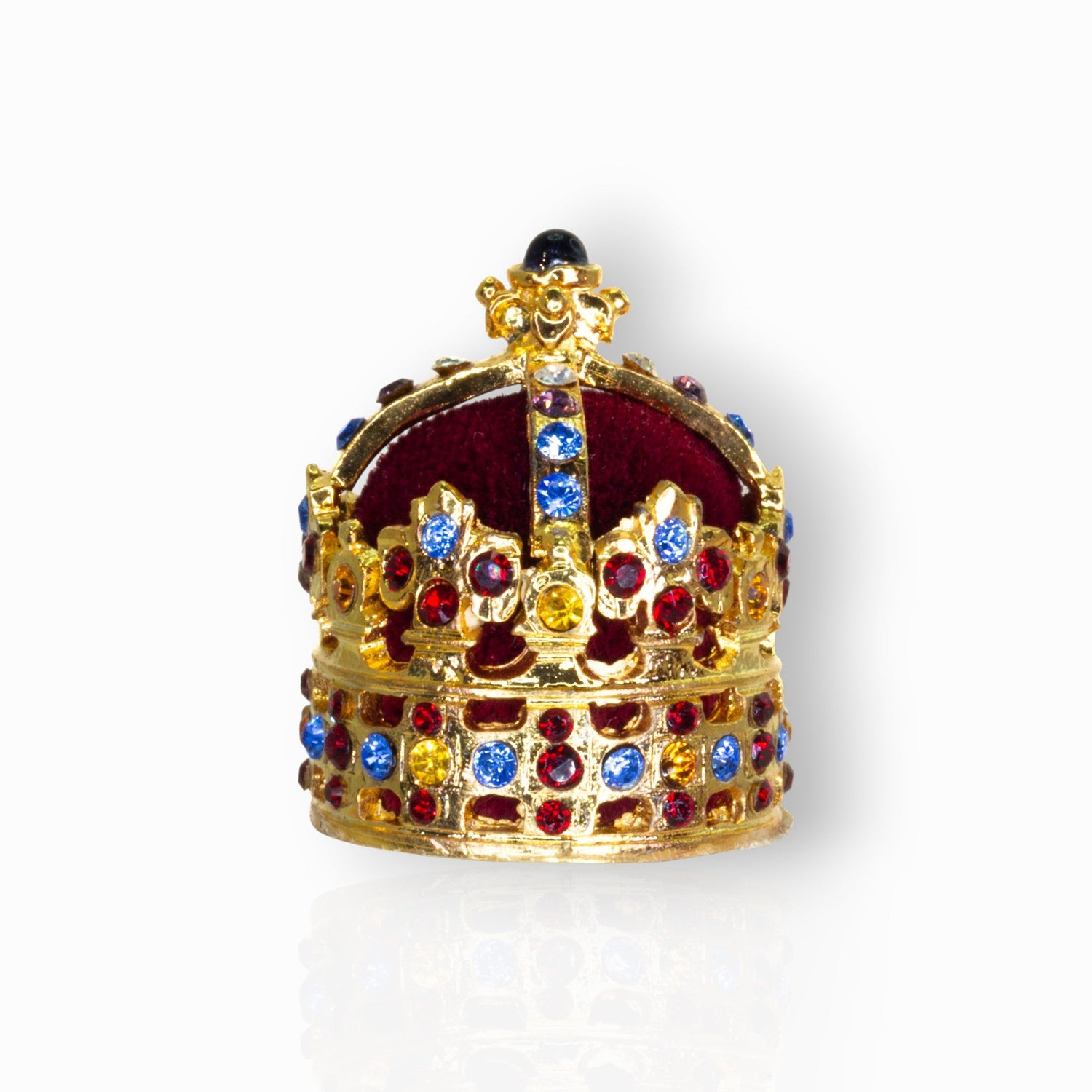 Decorative crown with colorful gemstones on a white background.