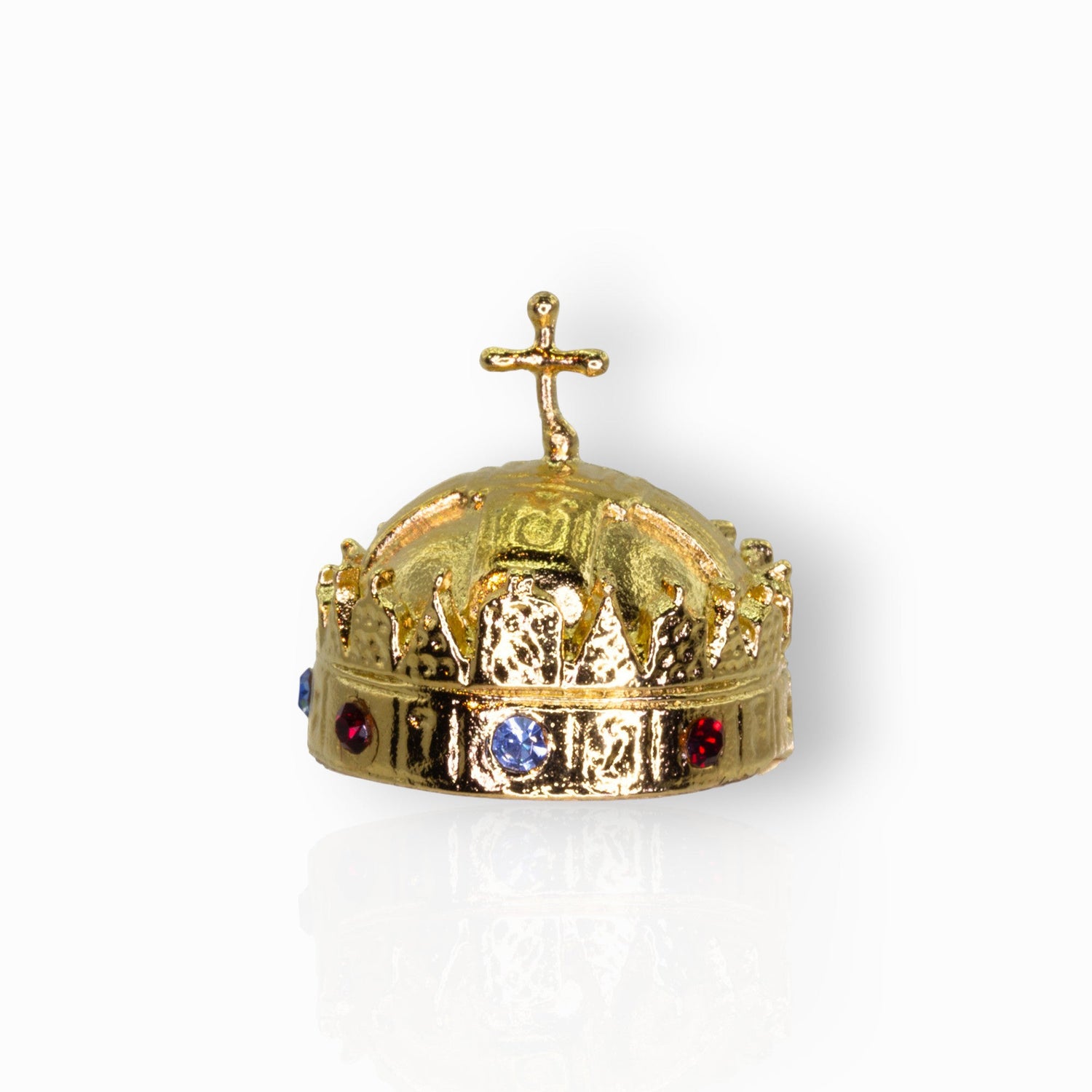 Gold crown with a cross on top, featuring colored gemstones, on a white background.