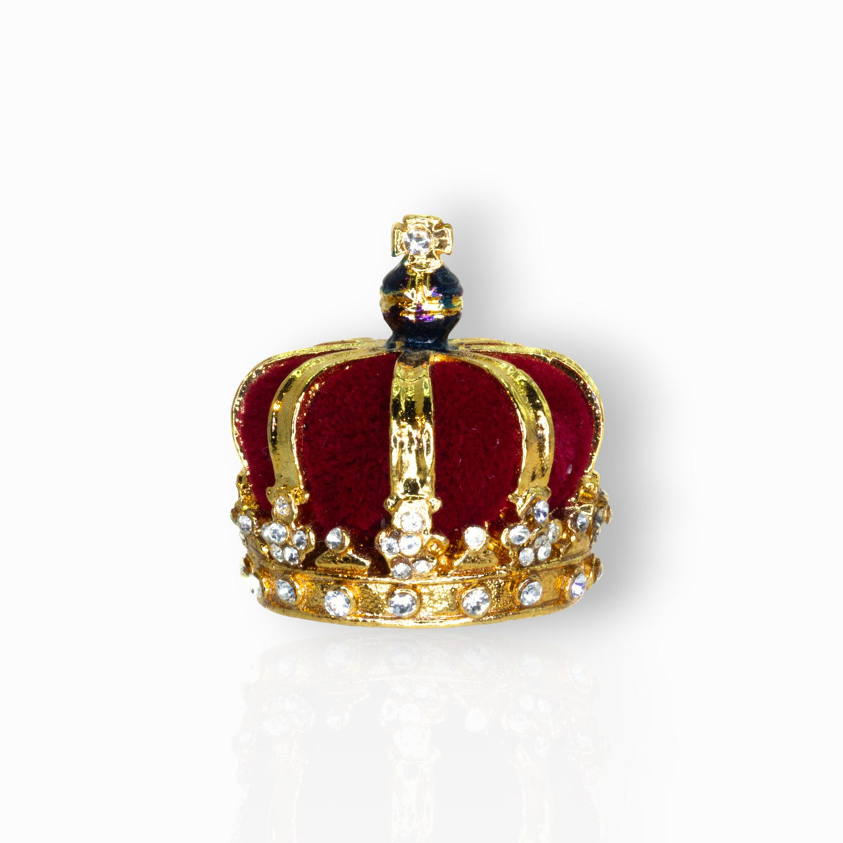 Gold crown with a cross on top, featuring colored gemstones, on a white background.