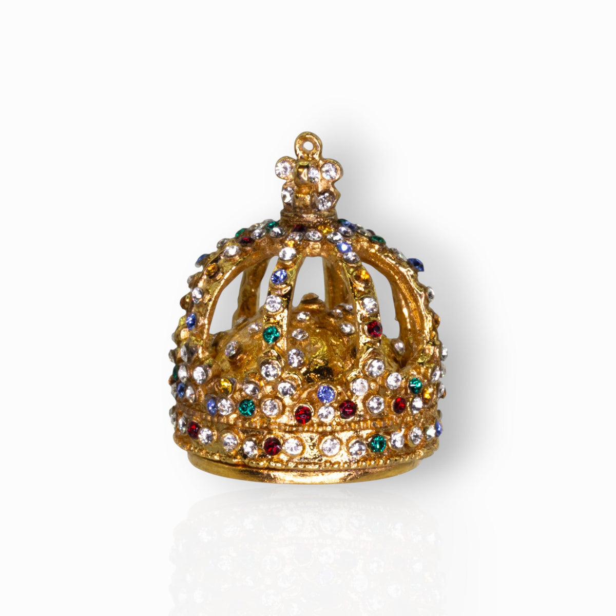 Decorative gold crown with colorful gemstones on a white background.