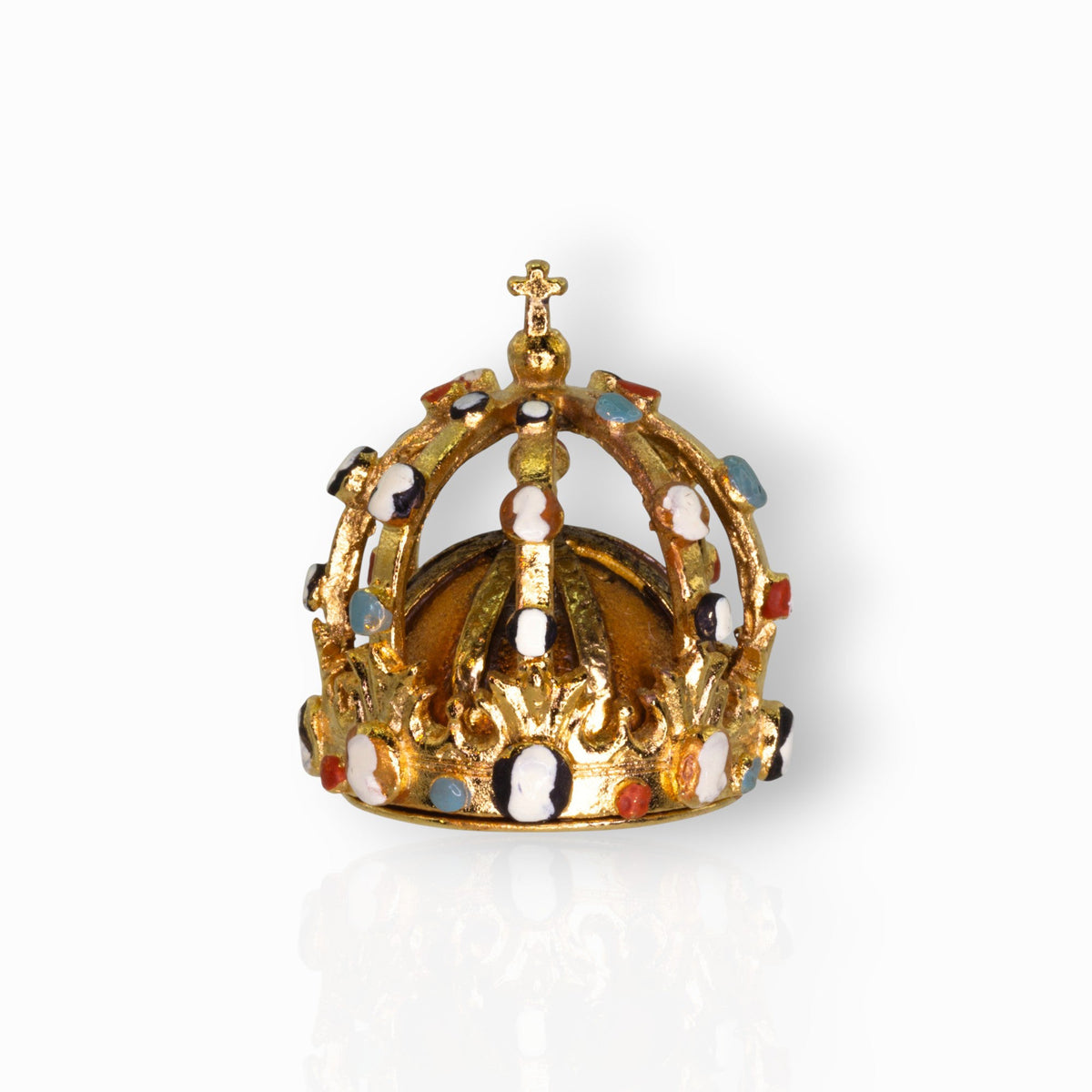 Gold crown with colored stones on a white background.