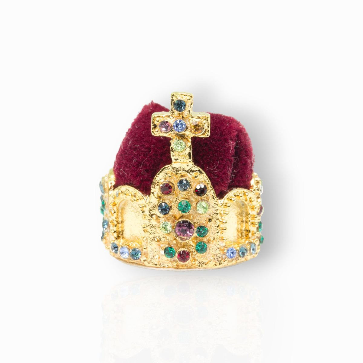 Gold crown with colorful gemstones on a white background.