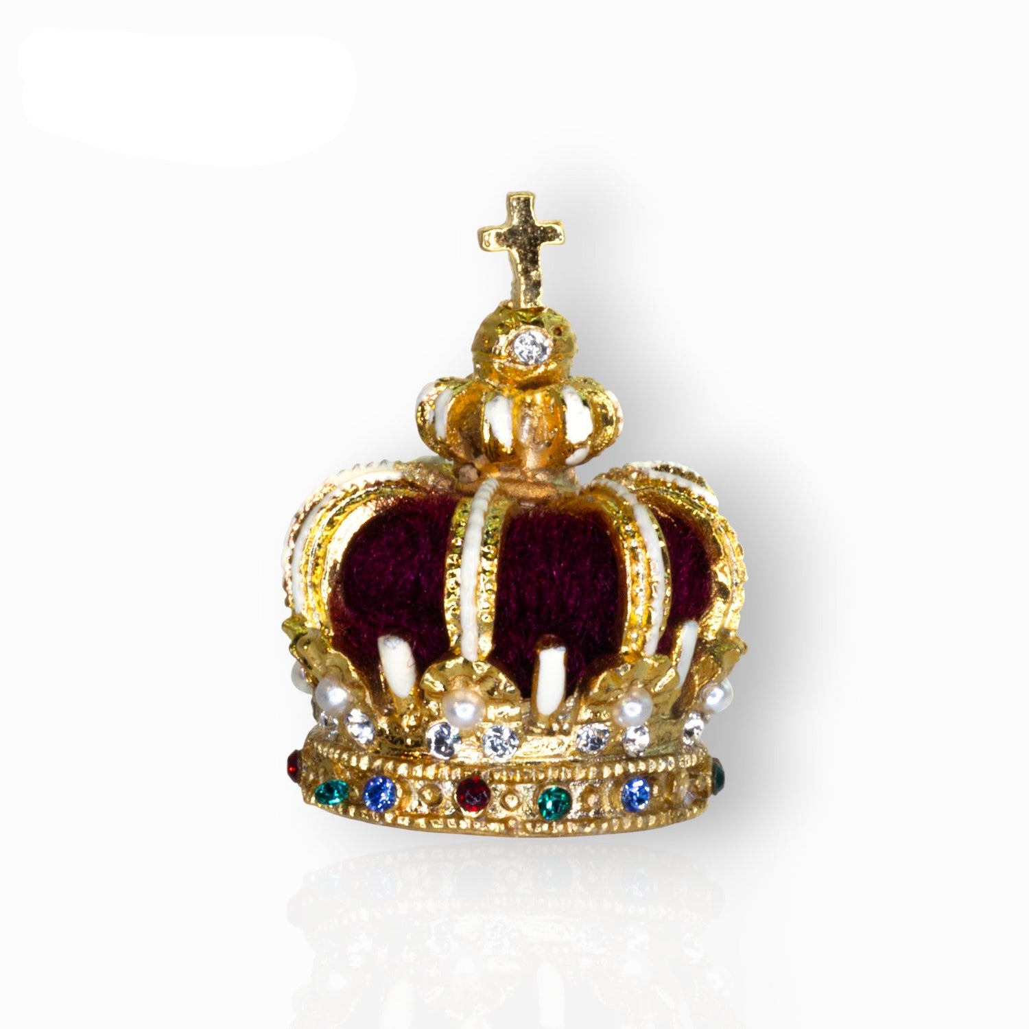 Gold crown with jewels on a white background.