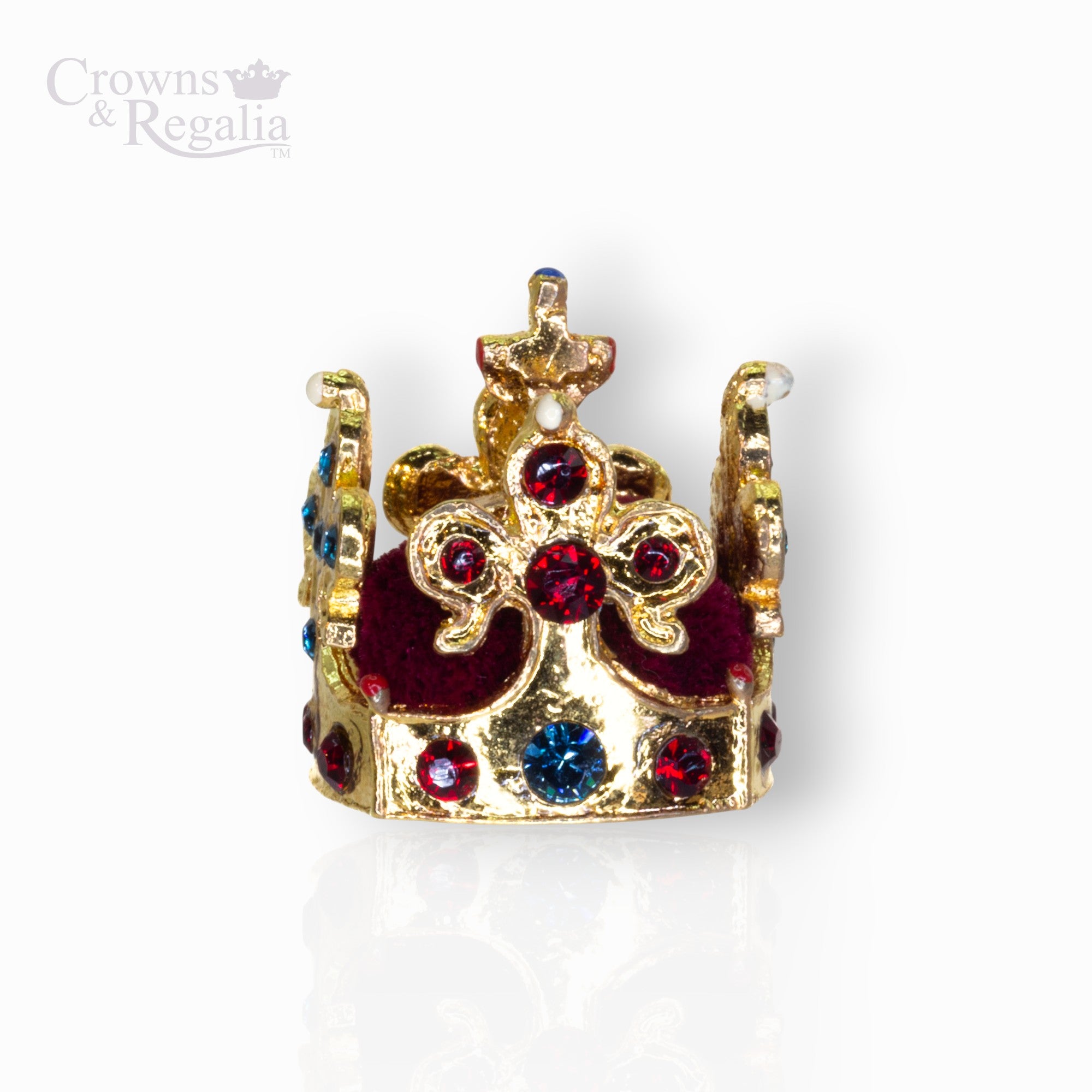 Gold crown with red and blue gemstones on a white background, branded 'Crowns & Regalia'.