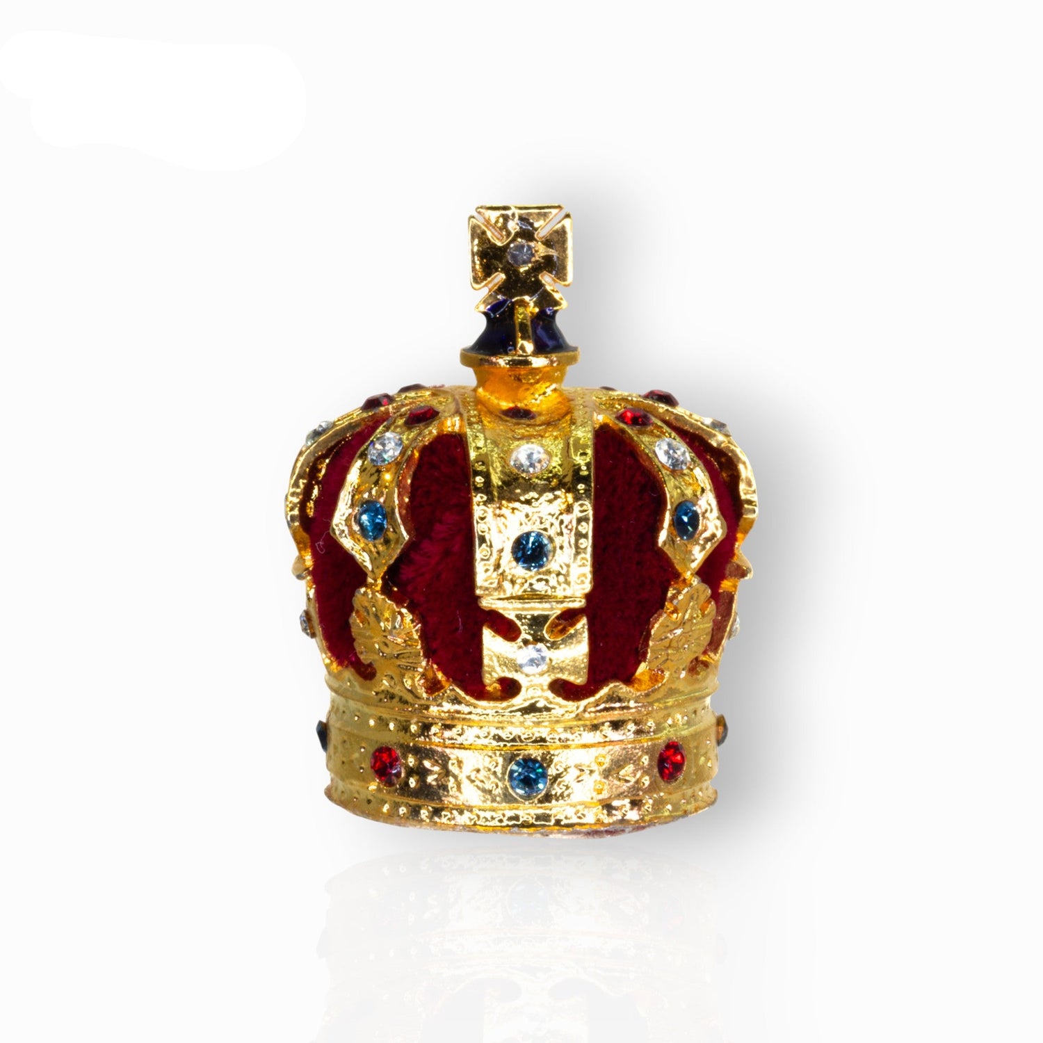 Gold crown with red and blue accents on a white background.