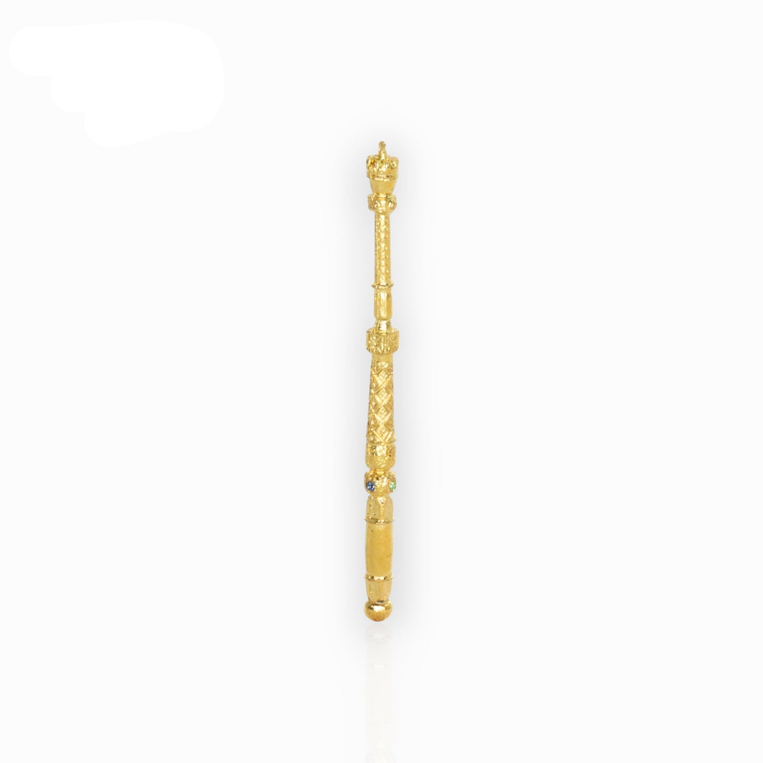 Gold sceptre with decorative design on a white background.