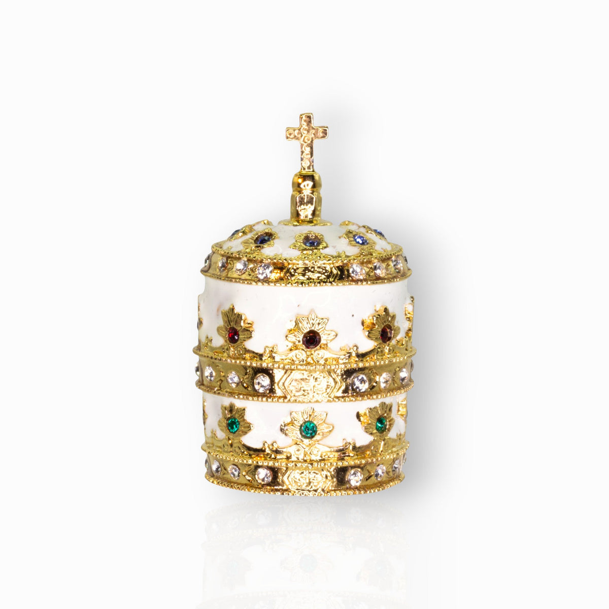Decorative gold crown with gemstones on a white background.