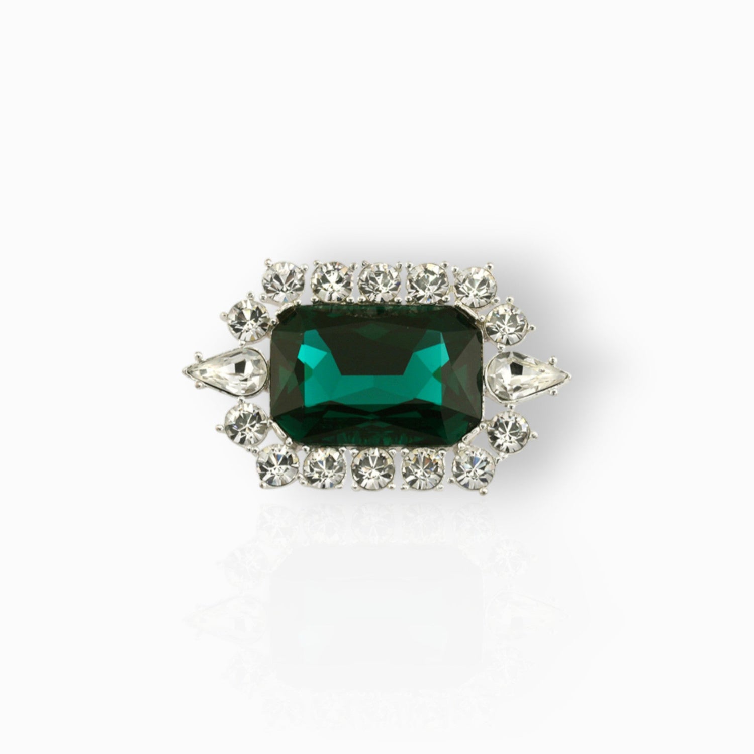 British Crown of India Emerald Crystal - Brooch on a white background.