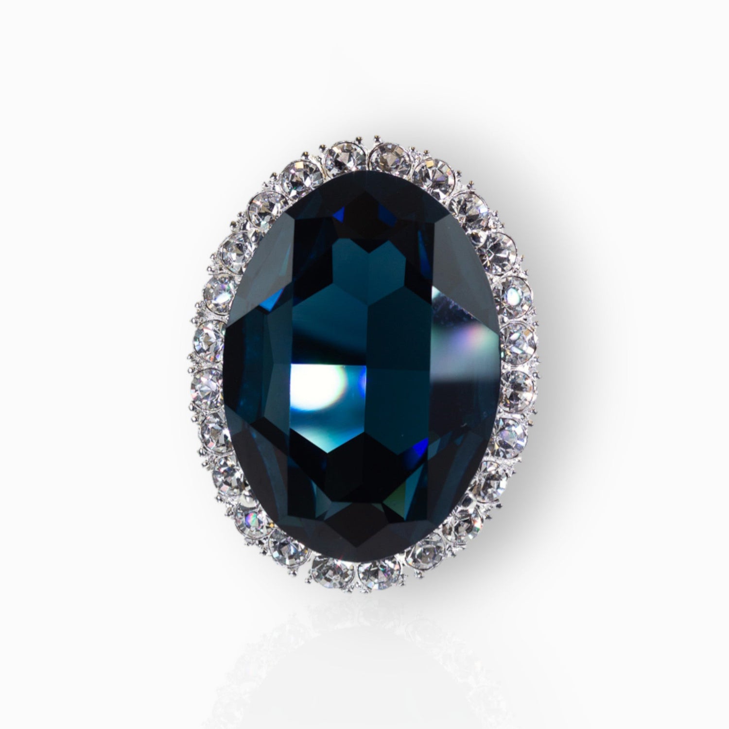 Princess Diana Sapphire & Diamond - Brooch on a white background.