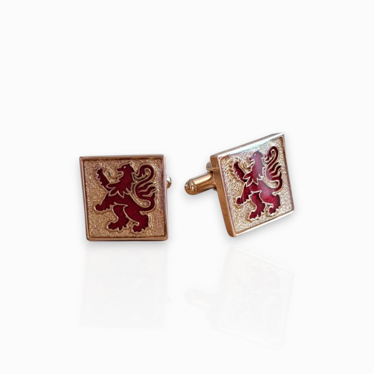 Lion Rampant Red and Gold - Cufflinks on a white background.