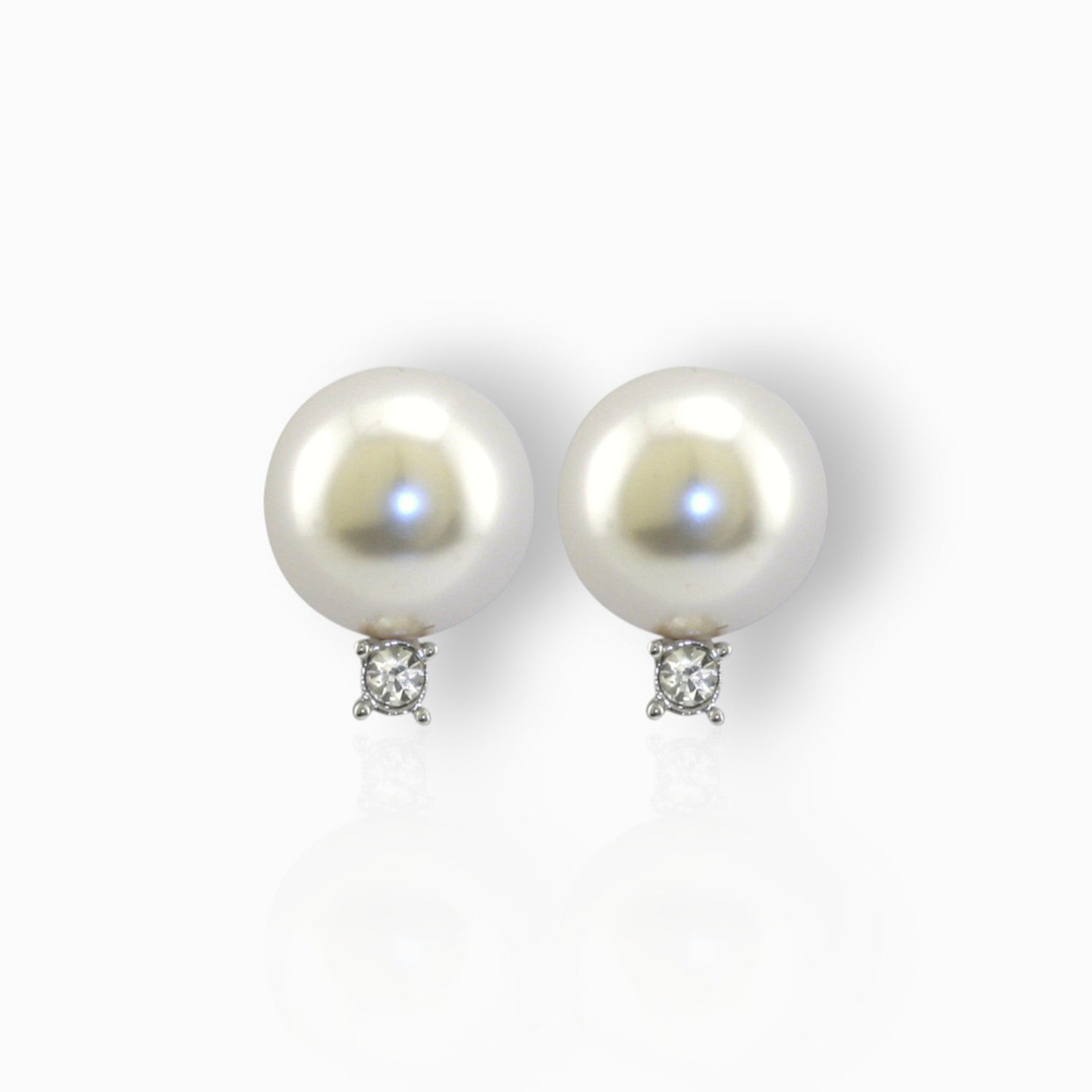 The Late Queen's Favourite Jewellery - Earrings on a white background.