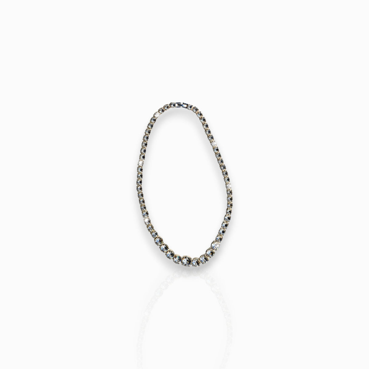 Katherine Hepburn - Necklace on a white background.