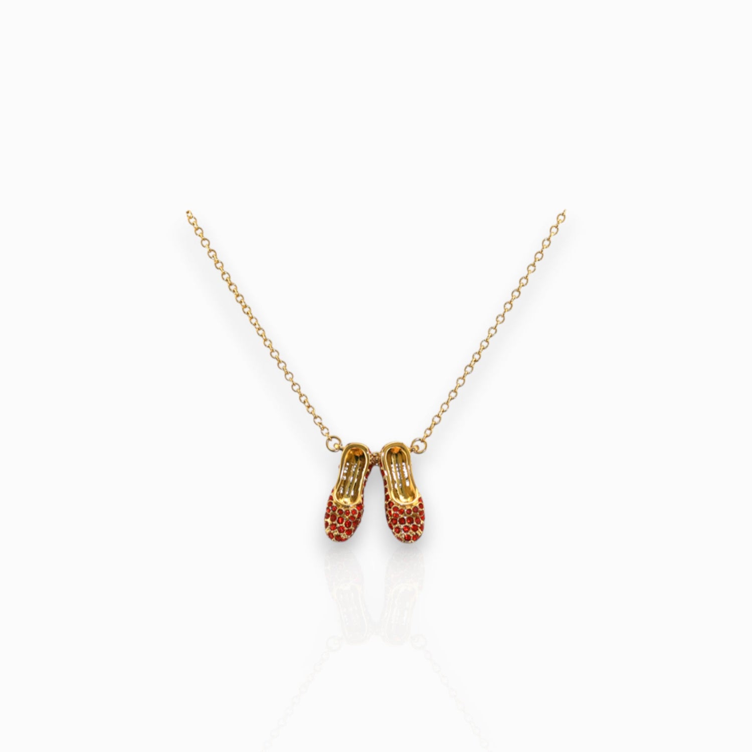 Wizard of Oz Dorothy Ruby Slippers - Necklace on a white background.