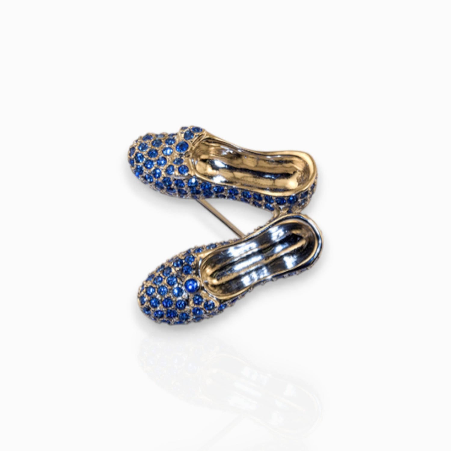 Wizard of Oz Dorothy Sapphire Slippers - Brooch on a white background.