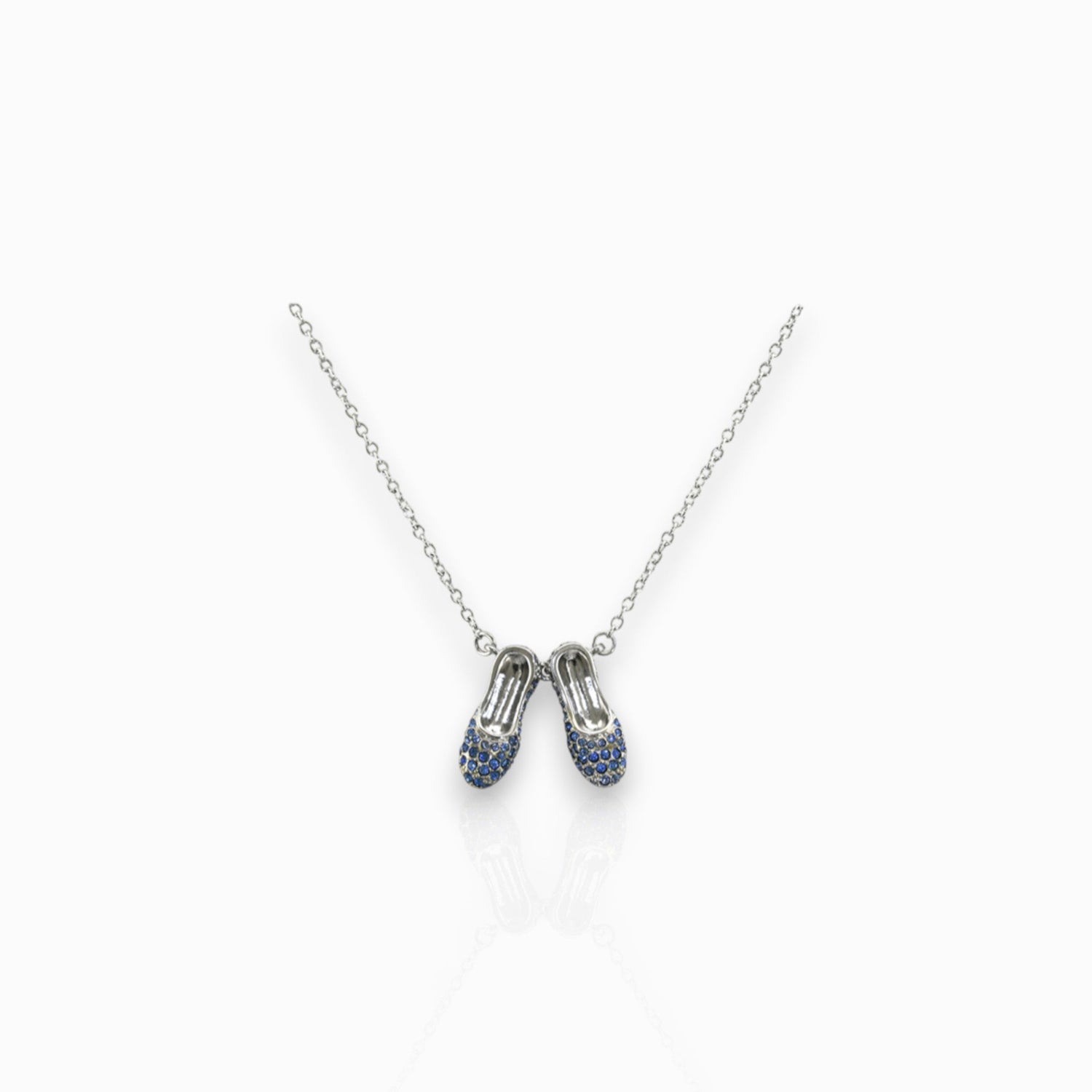 Wizard of Oz Dorothy Sapphire Slippers - Necklace on a white background.