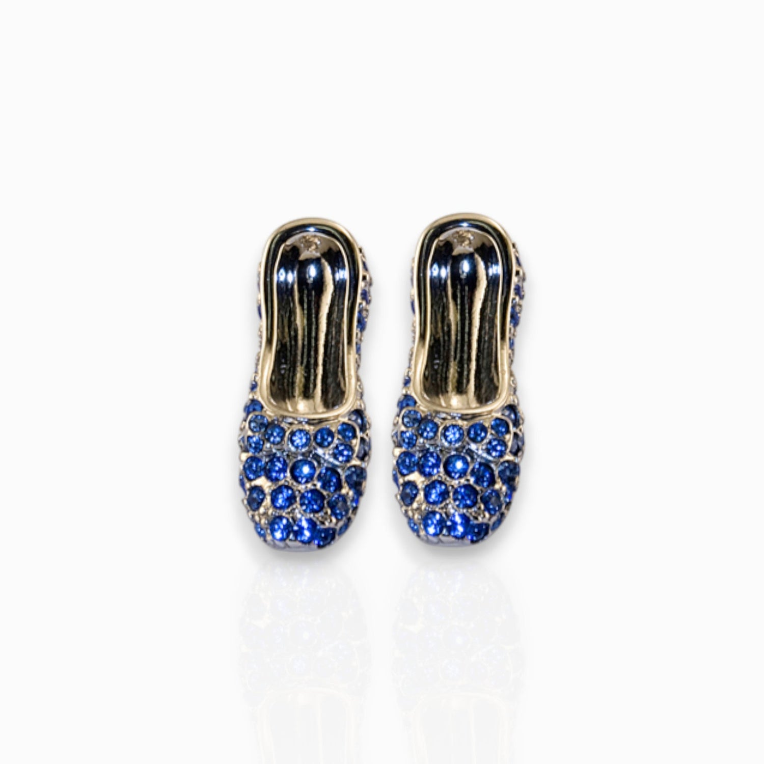 Wizard of OZ Dorothy Sapphire Slippers - Earrings on a white background.