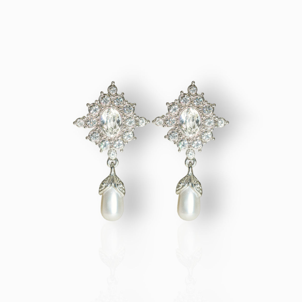 Princess Diana Crystal & Pearl - Earrings on a white background.