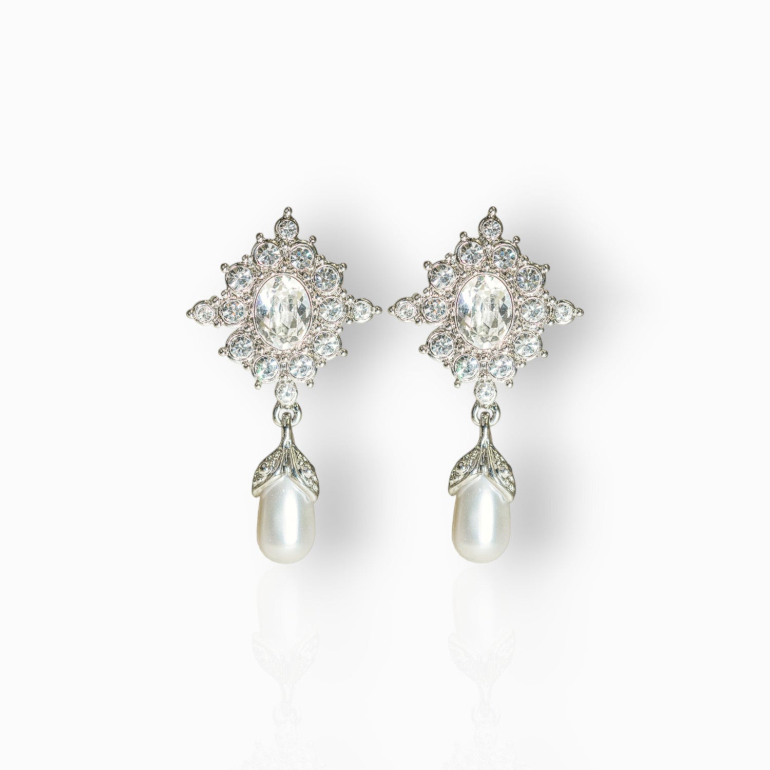 Princess Diana Crystal & Pearl - Earrings on a white background.
