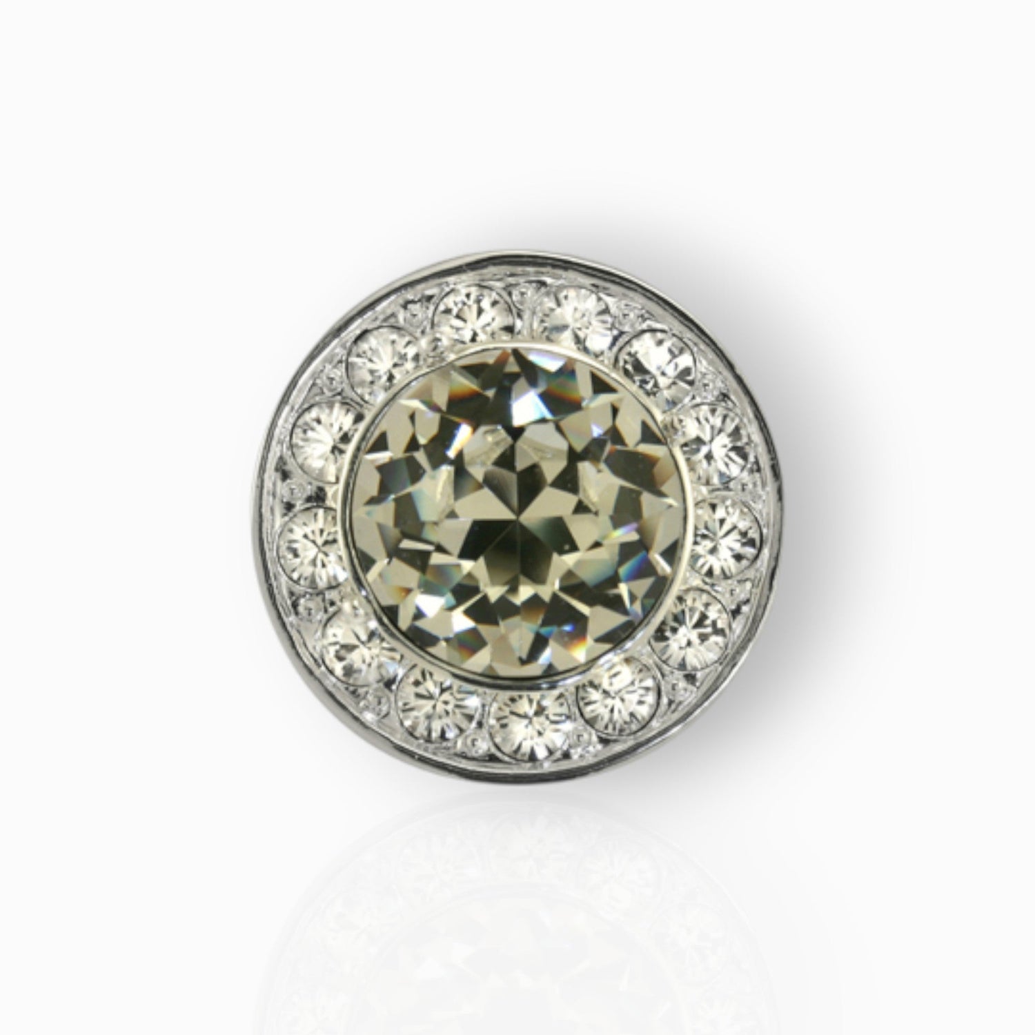Crown Monde - Brooch on a white background.