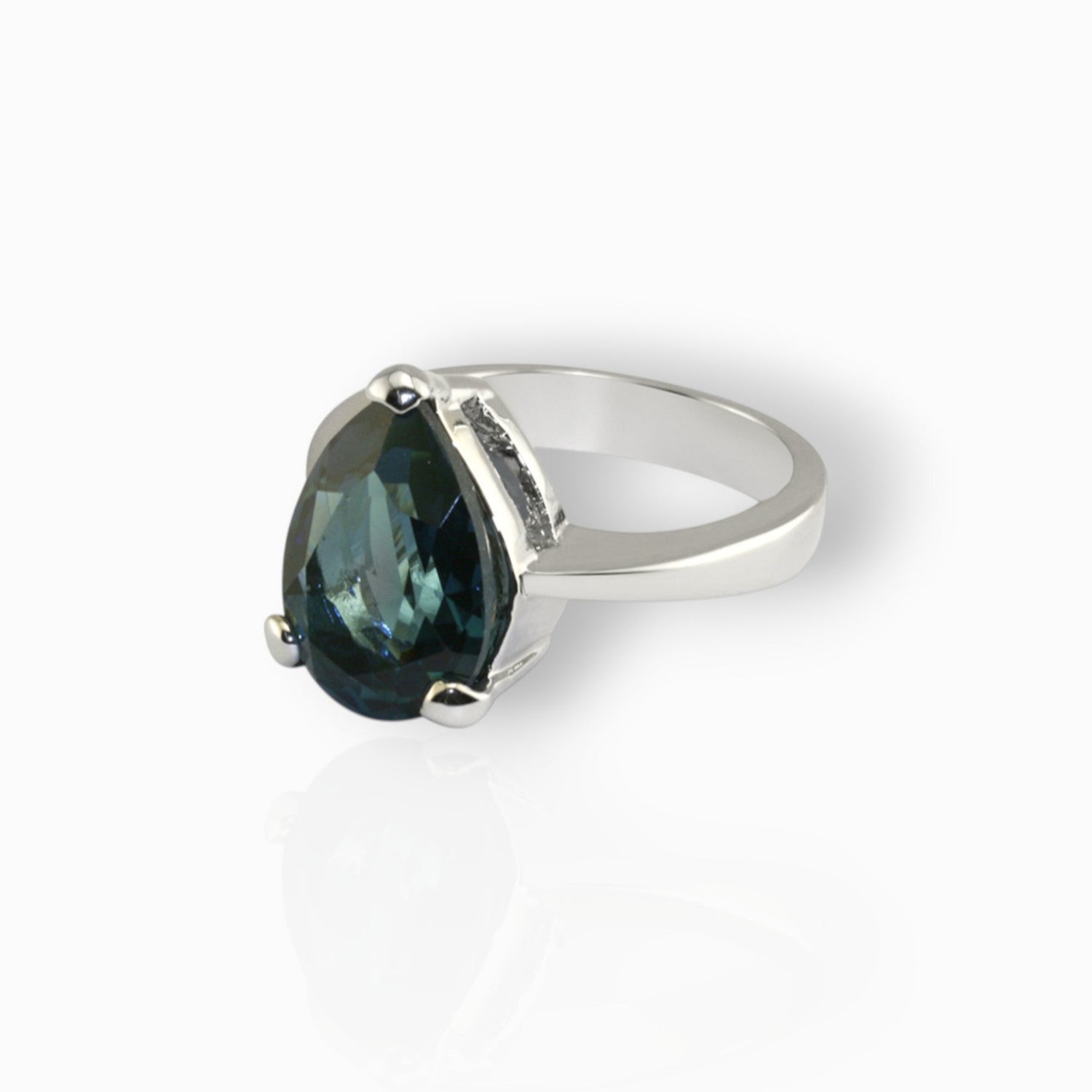 Queen Victoria's Sapphire Crystal Collet Drop - Ring on a white background.