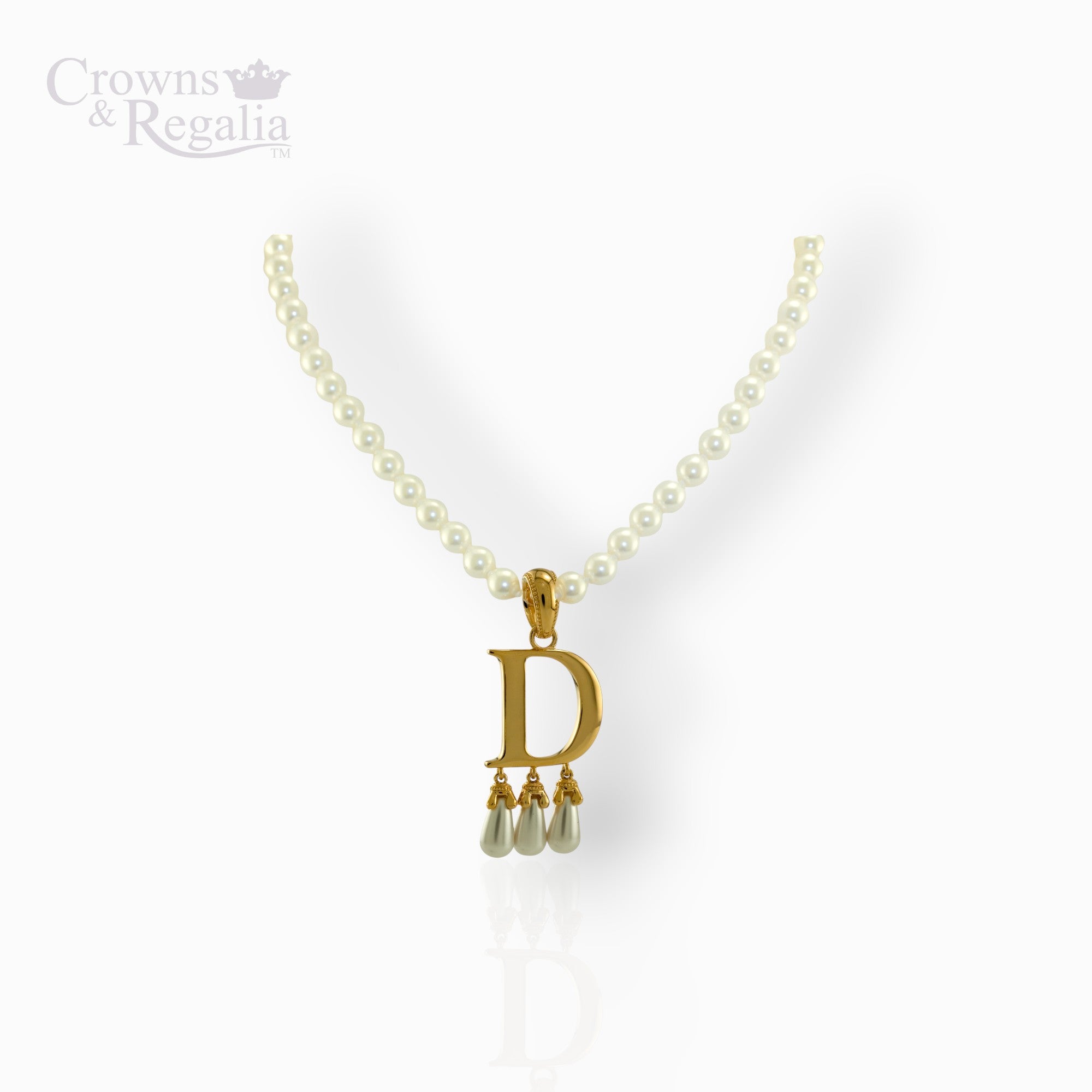 Pearl necklace with a gold pendant featuring the letter 'D' on a white background.