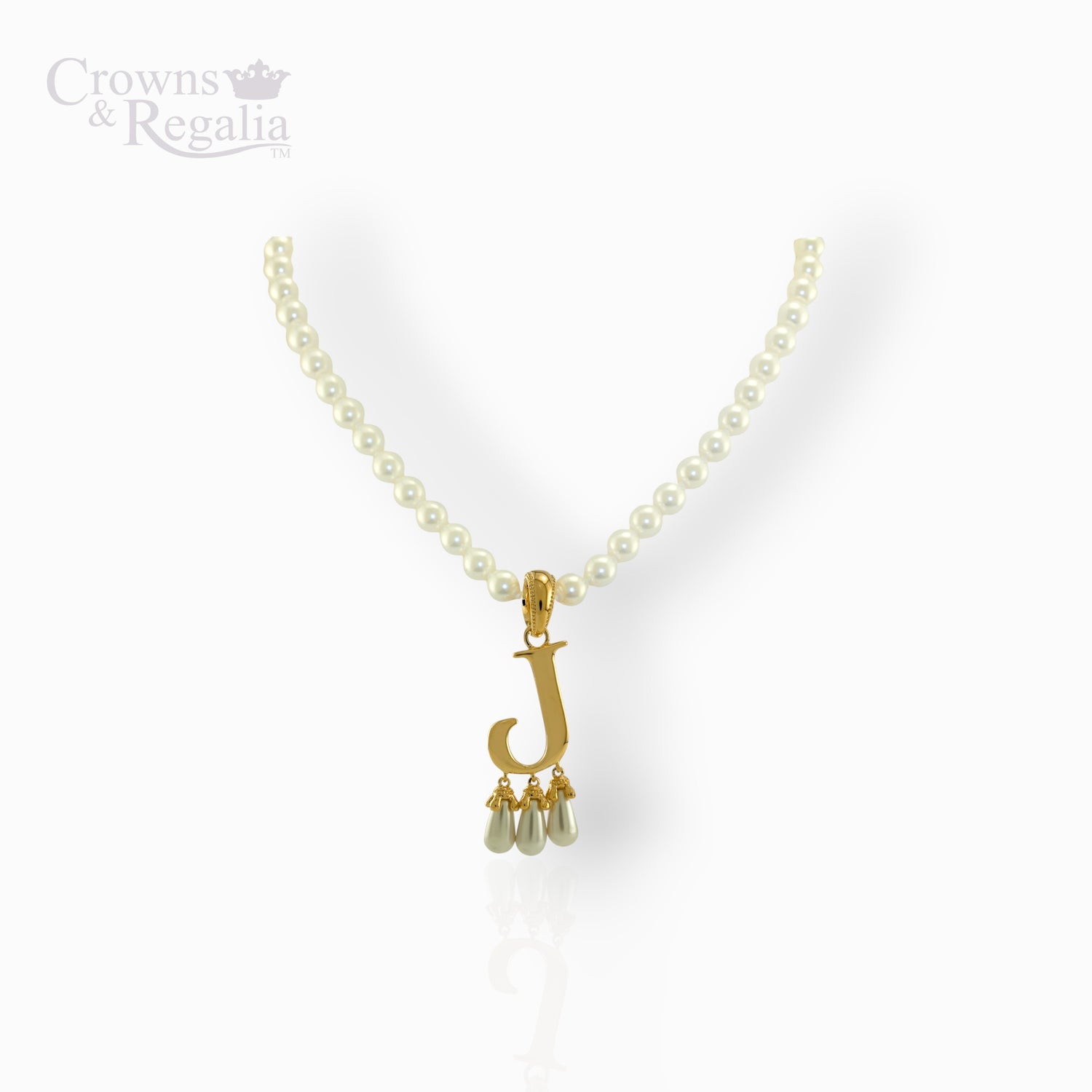 Pearl necklace with a gold pendant on a white background.