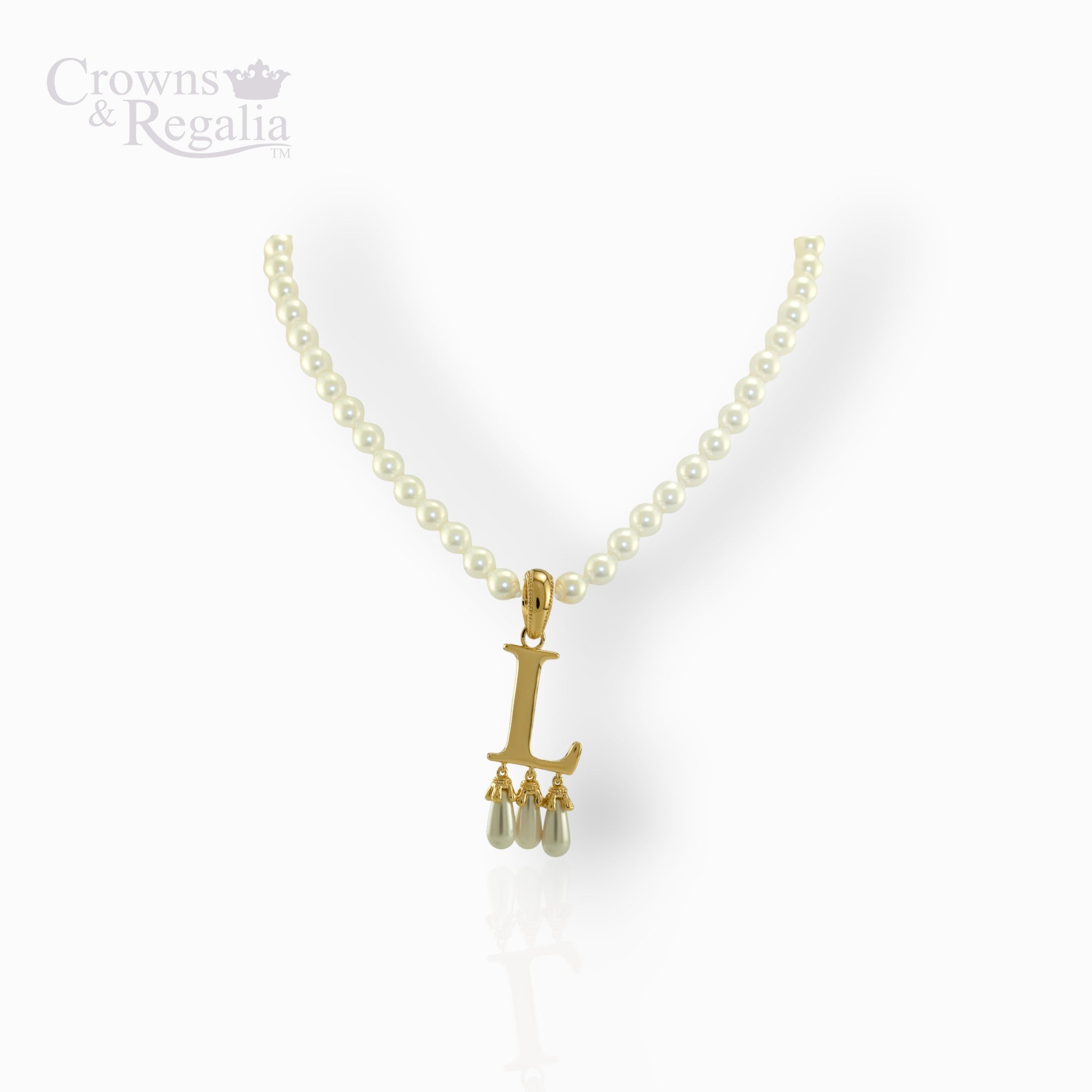 Pearl necklace with a gold pendant featuring the letter 'L' on a white background.