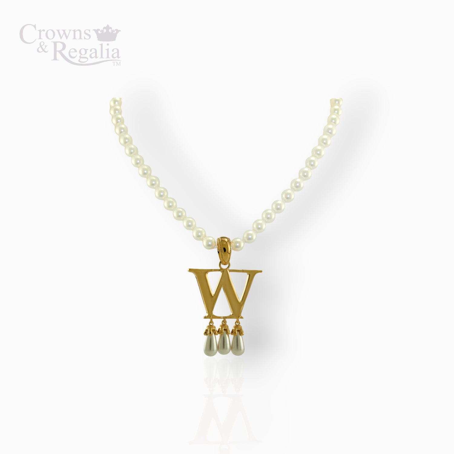 Gold necklace with a letter 'W' pendant and pearl drops on a white background, branded 'Crowns & Regalia'.